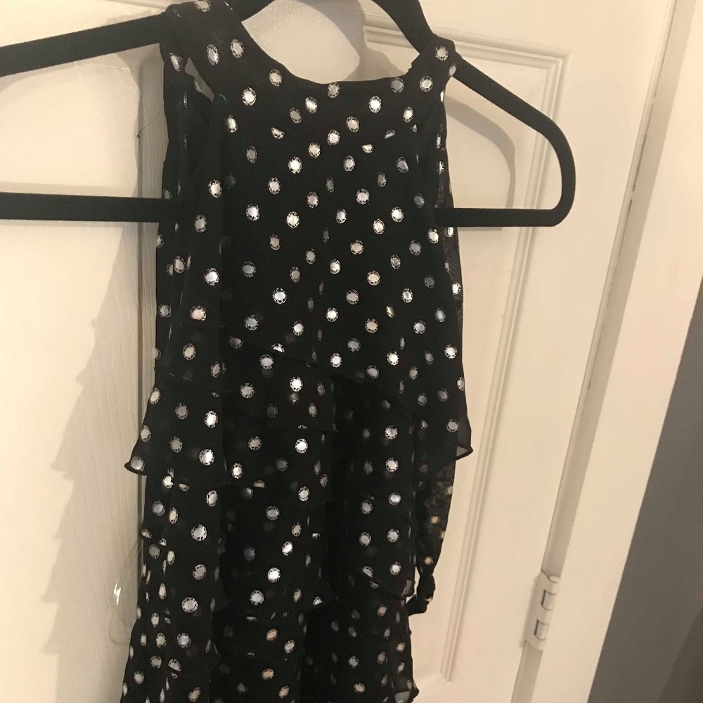 Black and silver ruffled blouse